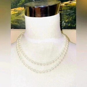 Faux pearls necklace. Long.  Stamped Claire’s